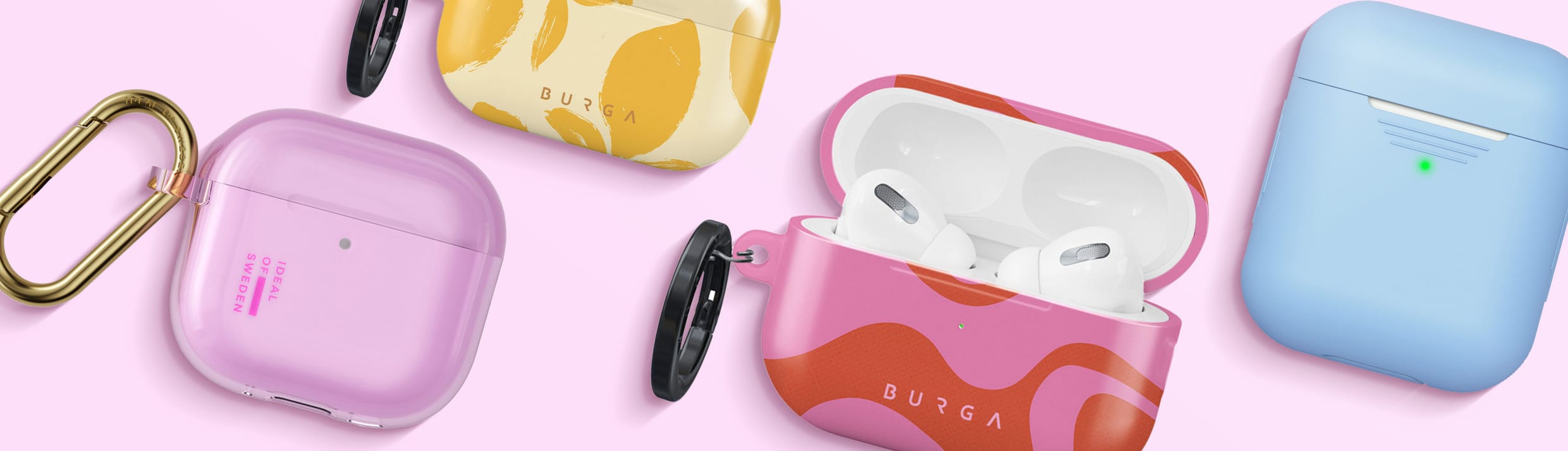 Verschillende gekleurde AirPods hoesjes van iDeal of Sweden, Burga en imoshion.
