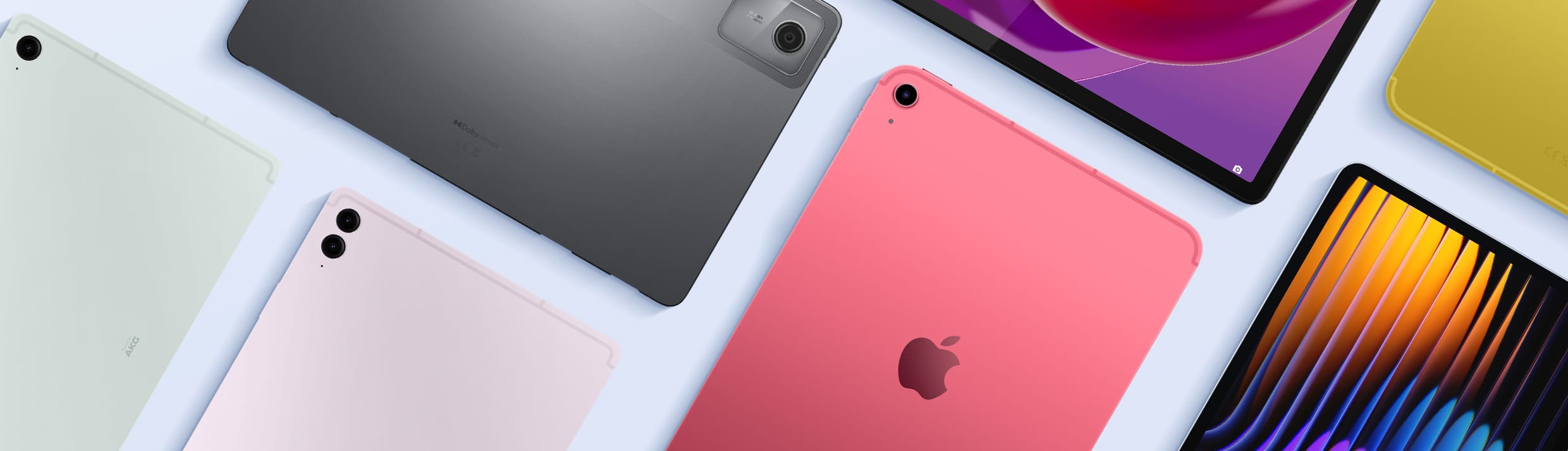 Meerdere tablets op een lichtblauwe achtergrond