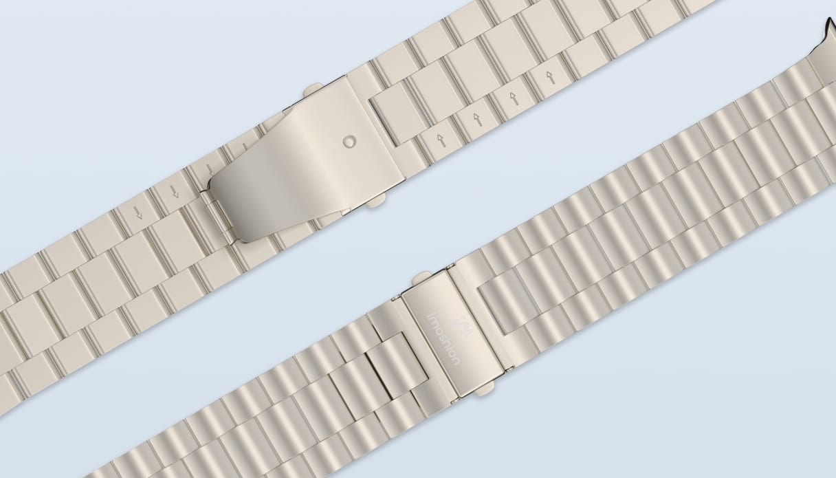 Foto van een smartwatchbandje met vlinder en vouw sluiting.