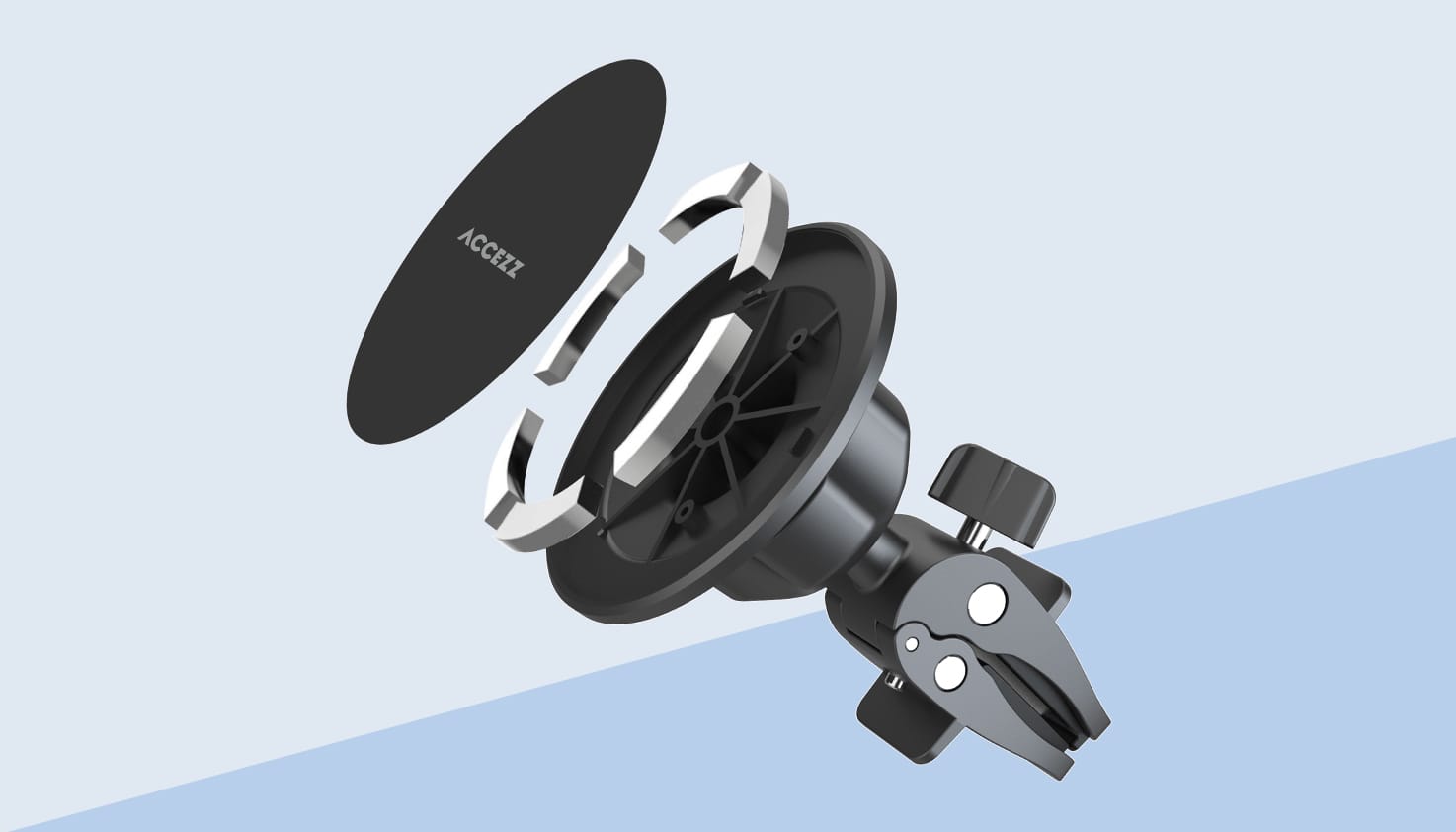 een foto van een magnetische telefoonhouder, uit elkaar gehaald om de werken te verduidelijken